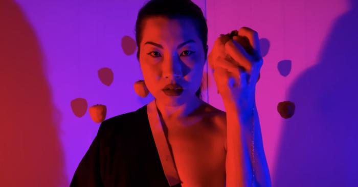 We Both Enjoy the Same Fruit, video still 